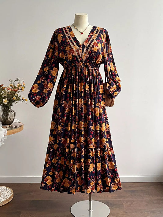Floral print maxi dress with V-neck, long balloon sleeves, gathered waist, tiered skirt