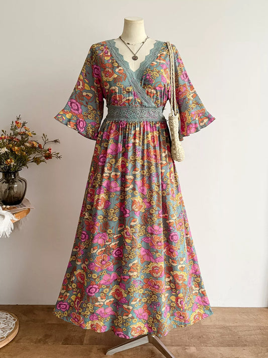 Plus size floral surplice dress with lace-trim V-neck and gathered waist, multicolor