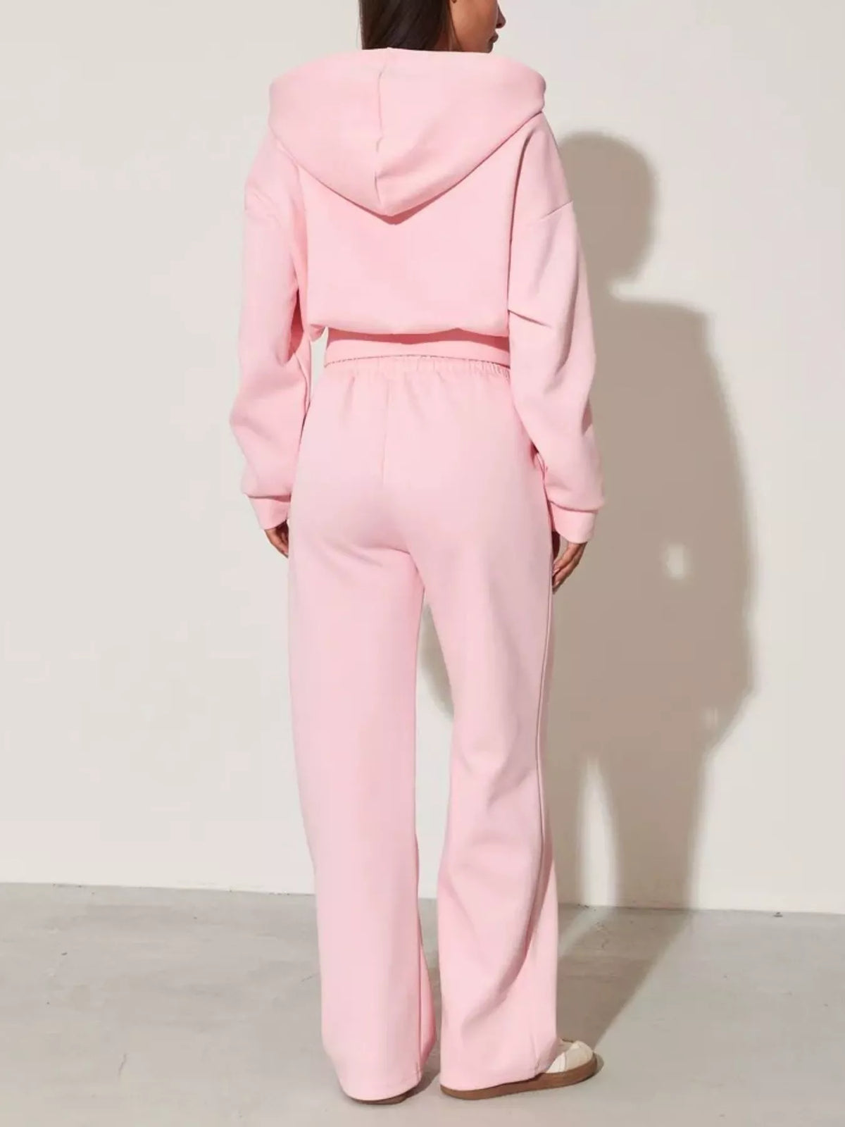 Pink zip-up hoodie and wide-leg pants set, back view with hood and long wide-leg pants