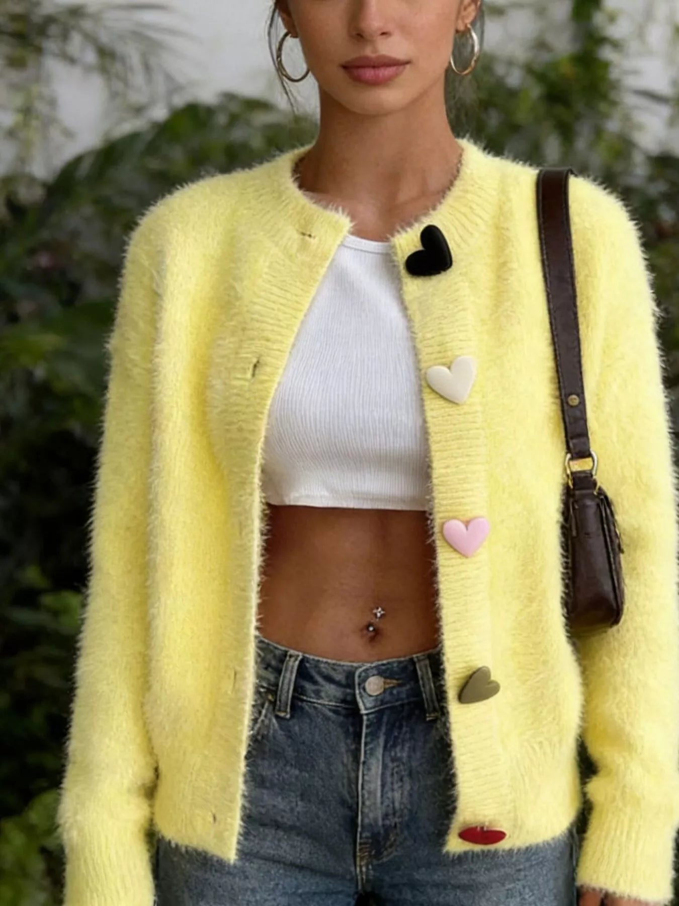 Yellow fuzzy long-sleeve cardigan with button-front and heart-shaped accents