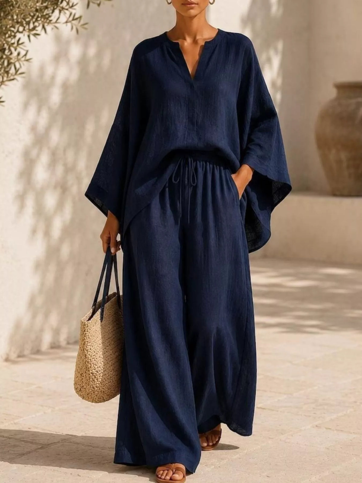Plus-size notched long-sleeve top and wide-leg pants set in navy, drawstring waist