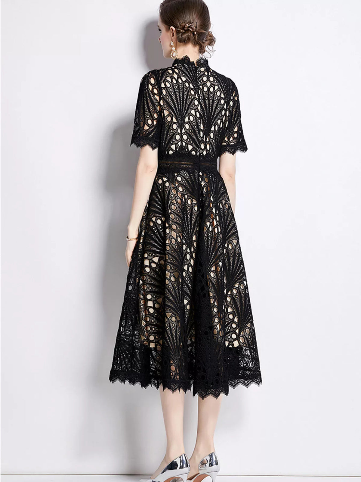 Plus-size lace short-sleeve midi dress in black from the back, paneled lace skirt