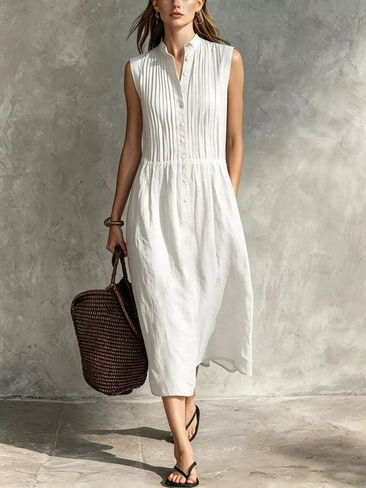 White sleeveless button-front midi dress with vertical pleats and gathered waist
