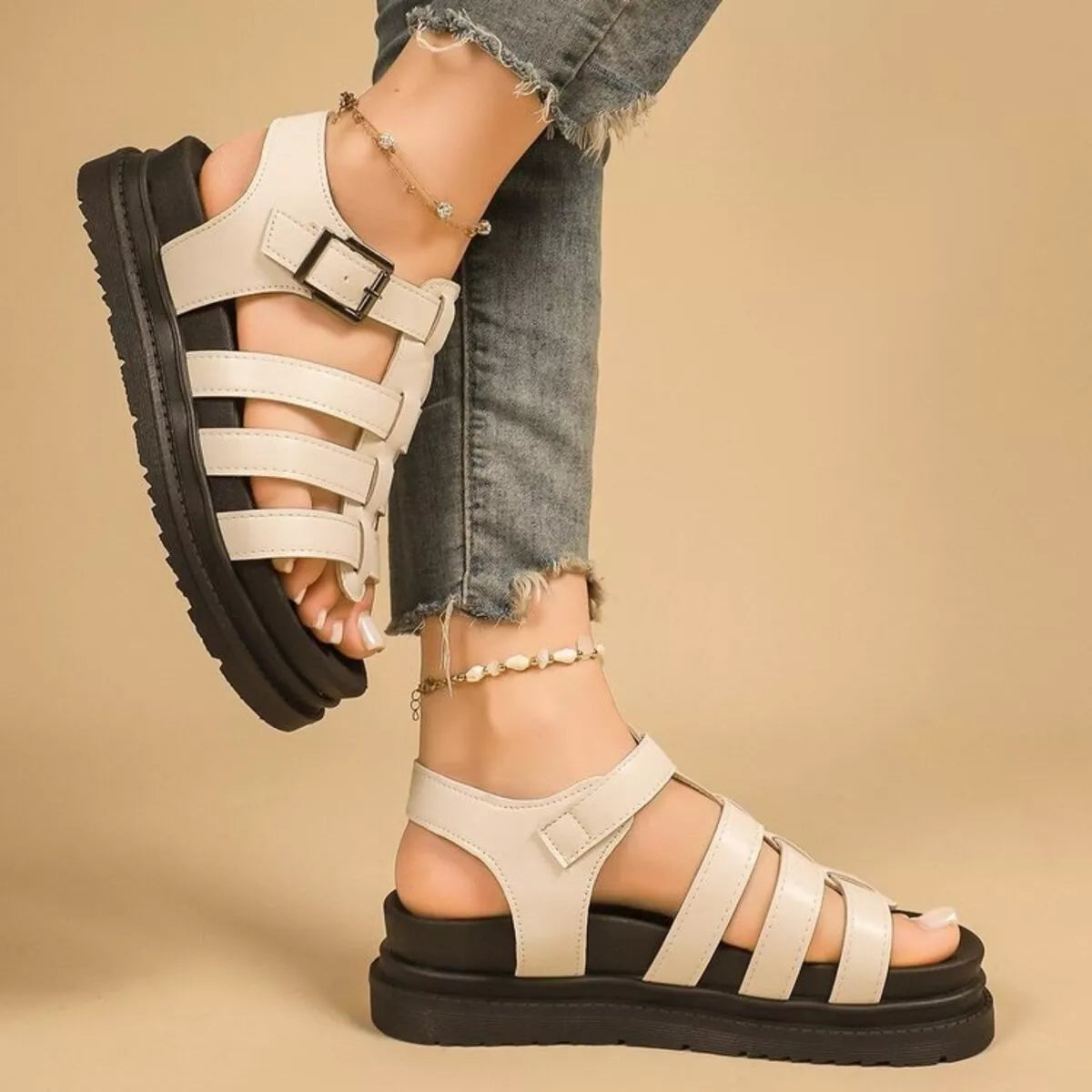 Off-white open-toe platform sandals with cross straps and side buckle detail