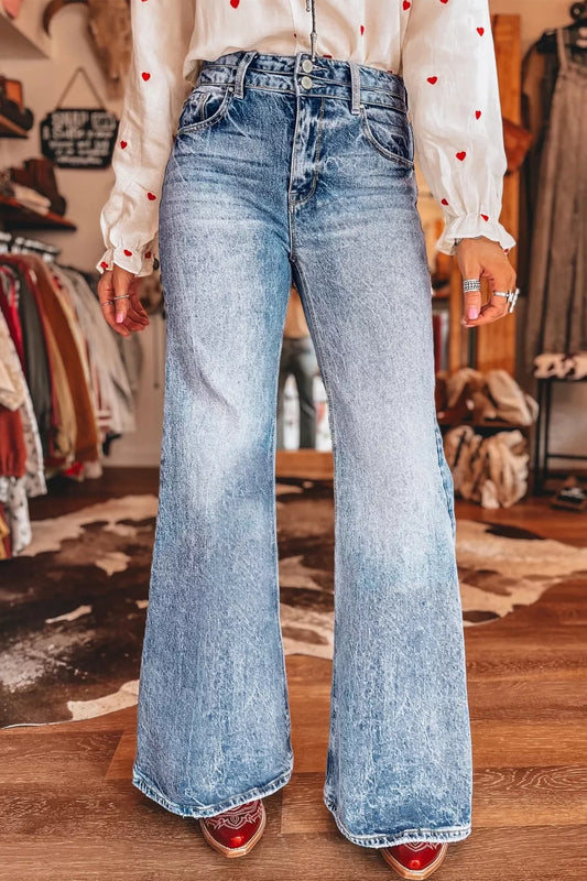 Light blue acid-wash flare jeans with front pocket detail