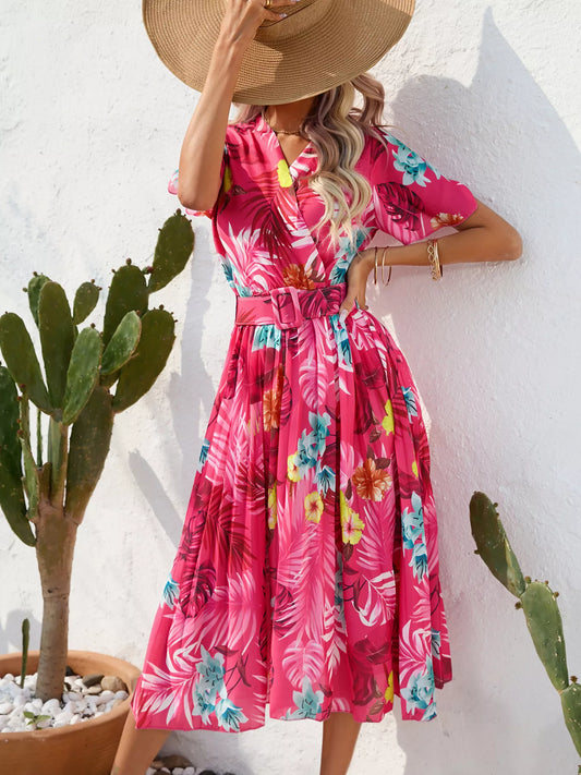 Hot pink pleated midi dress with tropical print, belted waist, short sleeves