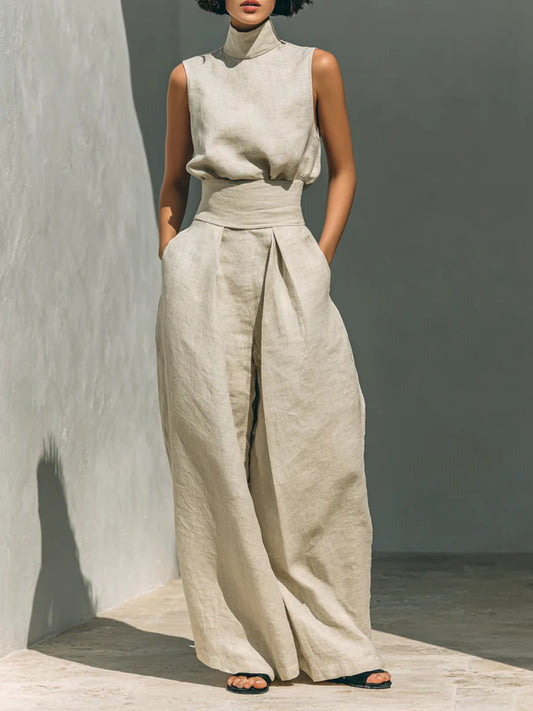 Ivory sleeveless turtleneck top and wide-leg pants set with waist tie