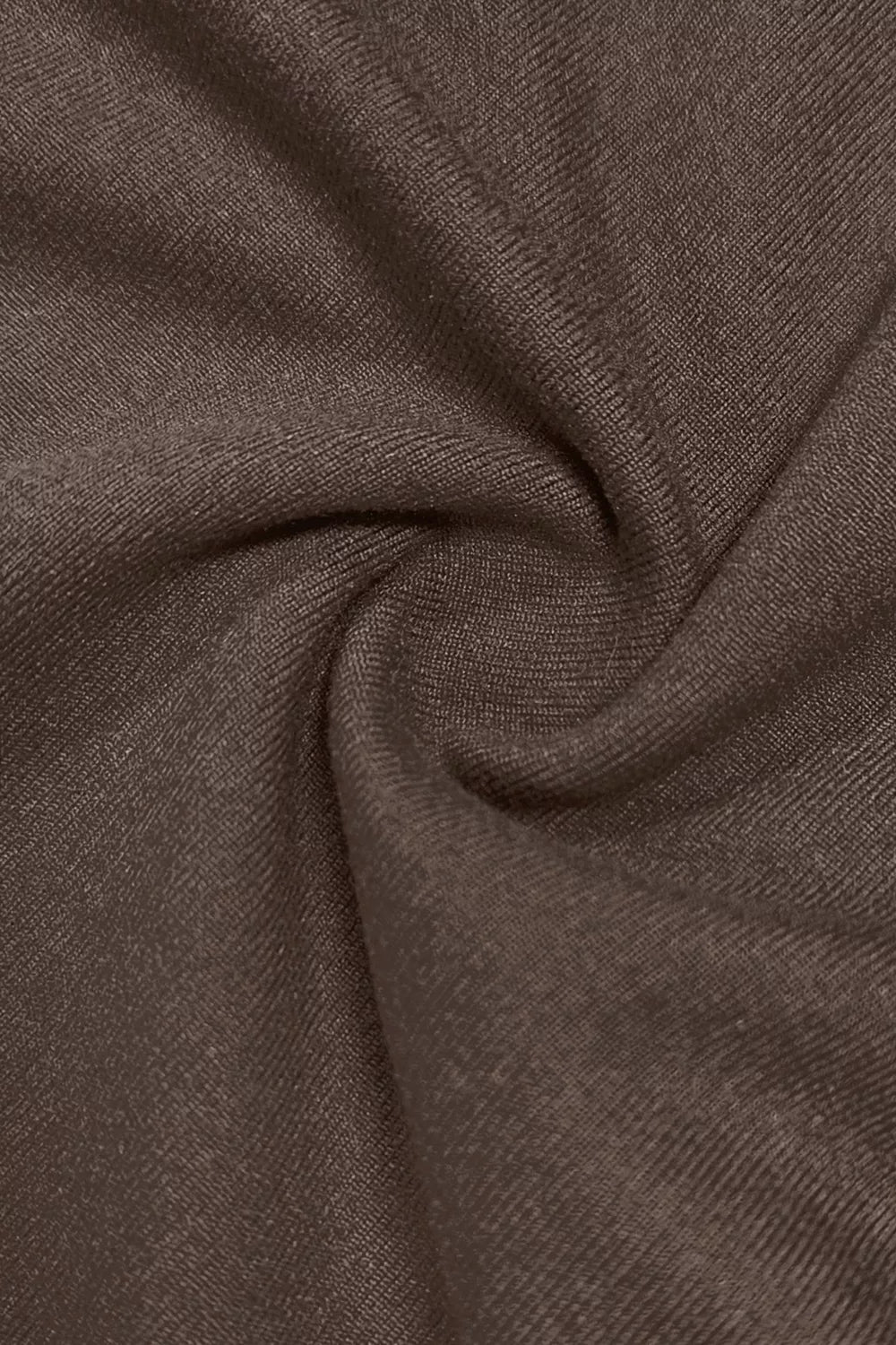 Coffee brown fabric close-up with soft textured knit finish