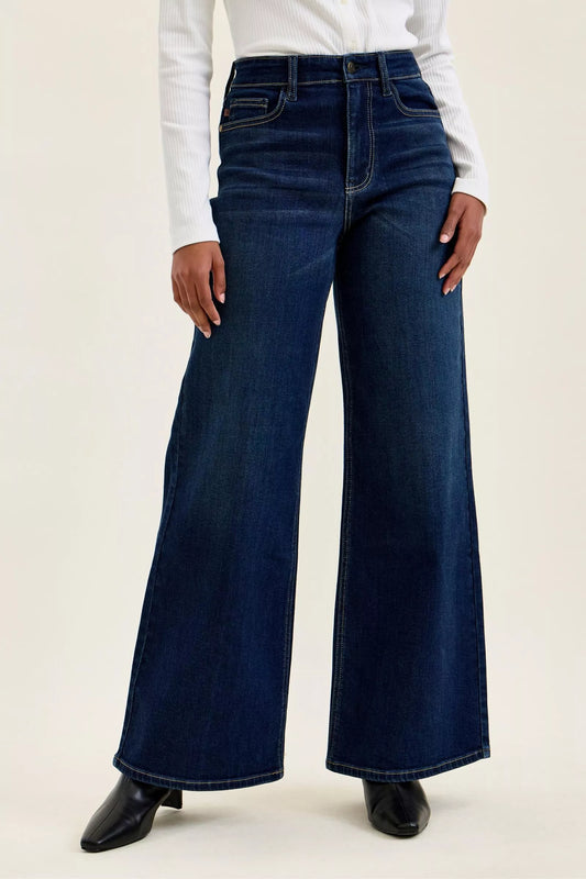 High-waisted wide-leg dark wash jeans with front seam and belt loops