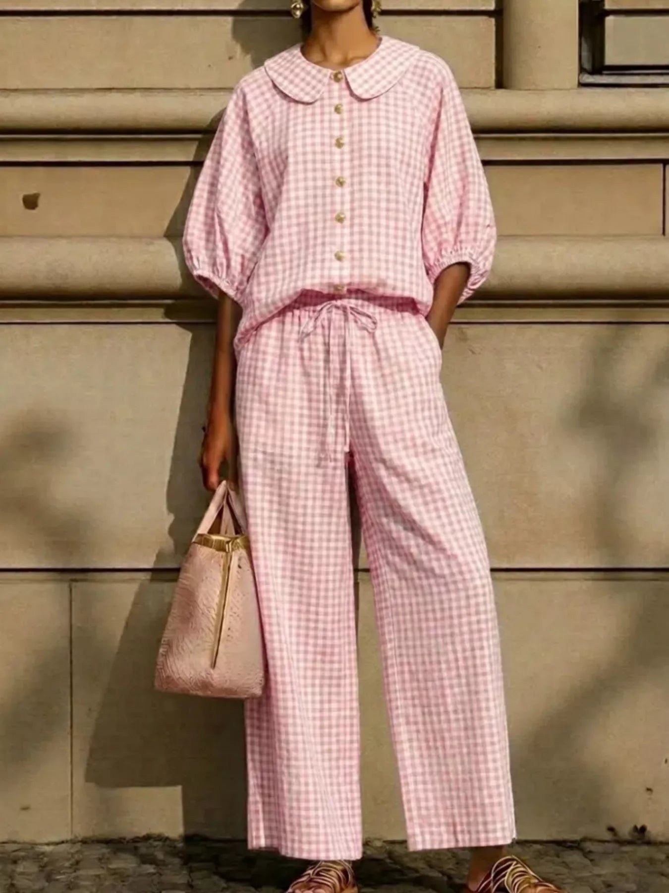 Pink plaid button-up shirt and wide-leg pants set with Peter Pan collar and front buttons.