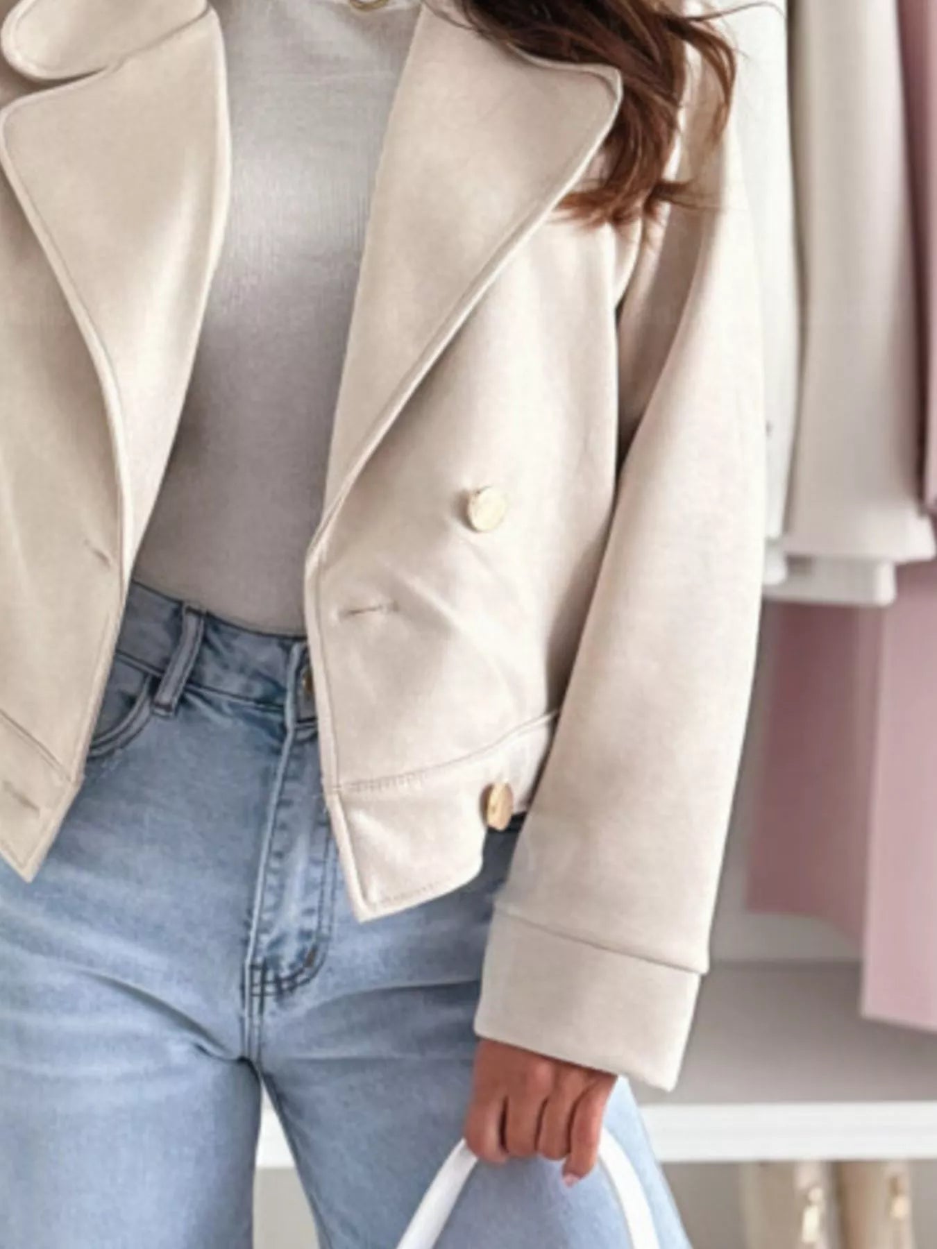 Cream cropped double-breasted jacket with gold buttons and side flap pockets