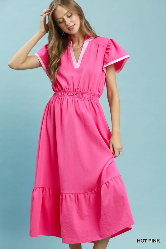 Hot pink midi dress with V-neck, gathered waist, and tiered ruffle hem