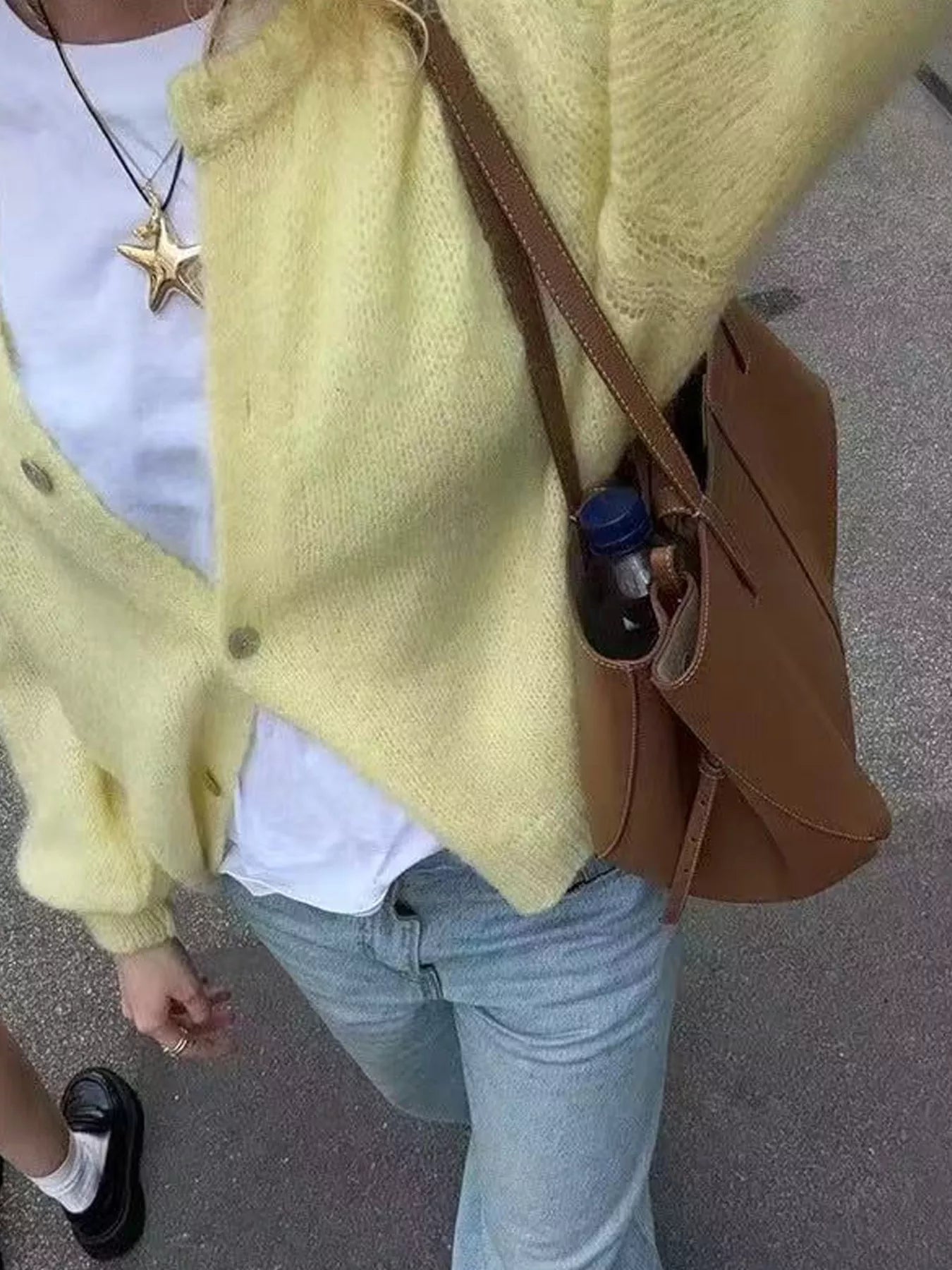 Yellow button-up long sleeve cardigan with front buttons and relaxed shoulder fit