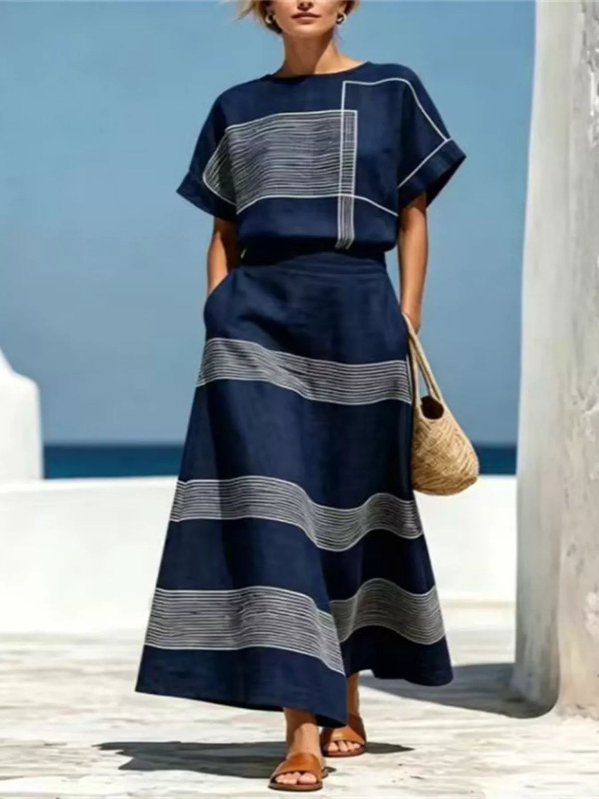 Navy blue striped round neck top and maxi skirt set with layered panel design