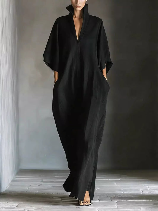 Black maxi dress with V-neck and loose 3/4 sleeves, front placket