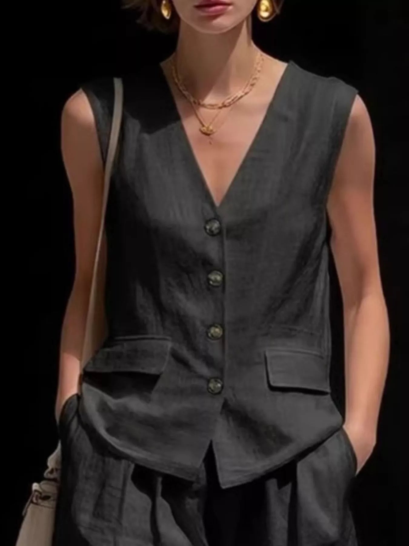 Black sleeveless vest and shorts set, V-neck button front, chest patch pocket