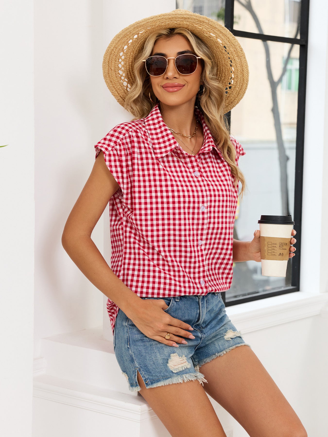 Red and white plaid cap sleeve button-up shirt with collar and button front