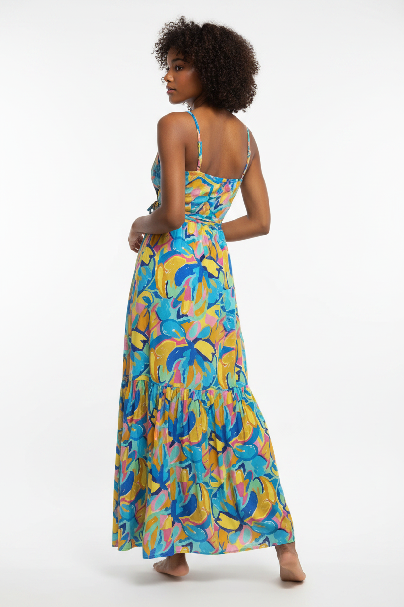 Back view of tiered wrap maxi dress with spaghetti straps, multicolored leaf print