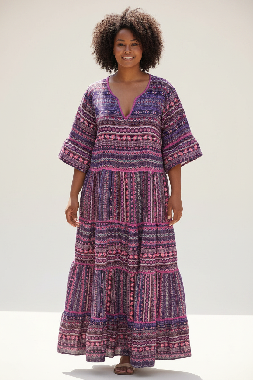Purple patterned tiered maxi dress with V-neck and flutter sleeves, plus size