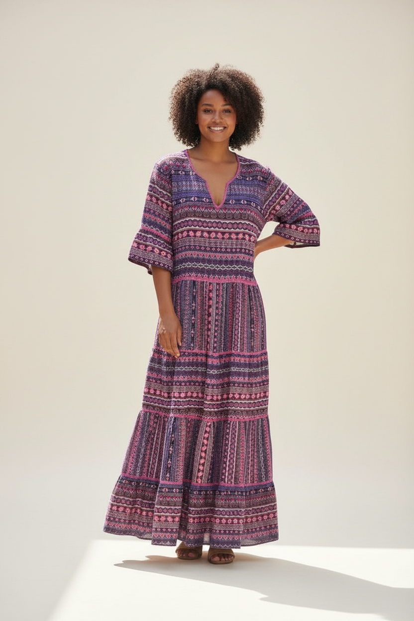 Tiered boho maxi dress with purple patterned tiers and elbow-length sleeves, plus size