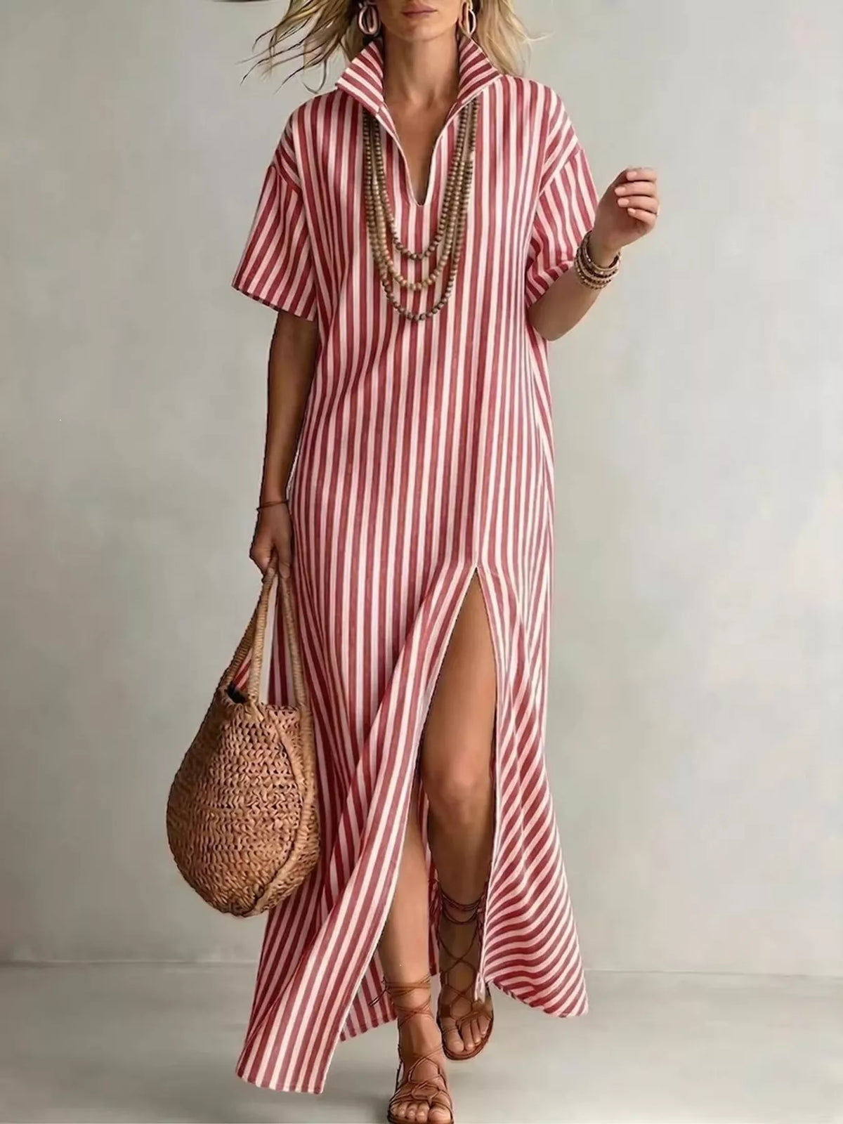 Red-and-white striped maxi dress with short sleeves, V-neck and side slit