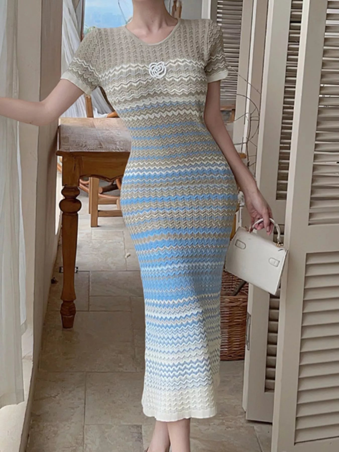 Light blue and cream zigzag knit midi dress with short sleeves and round neck