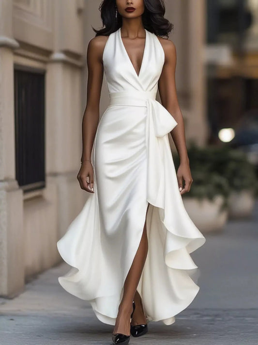 White ruffled halter neck maxi dress with draped front and side slit