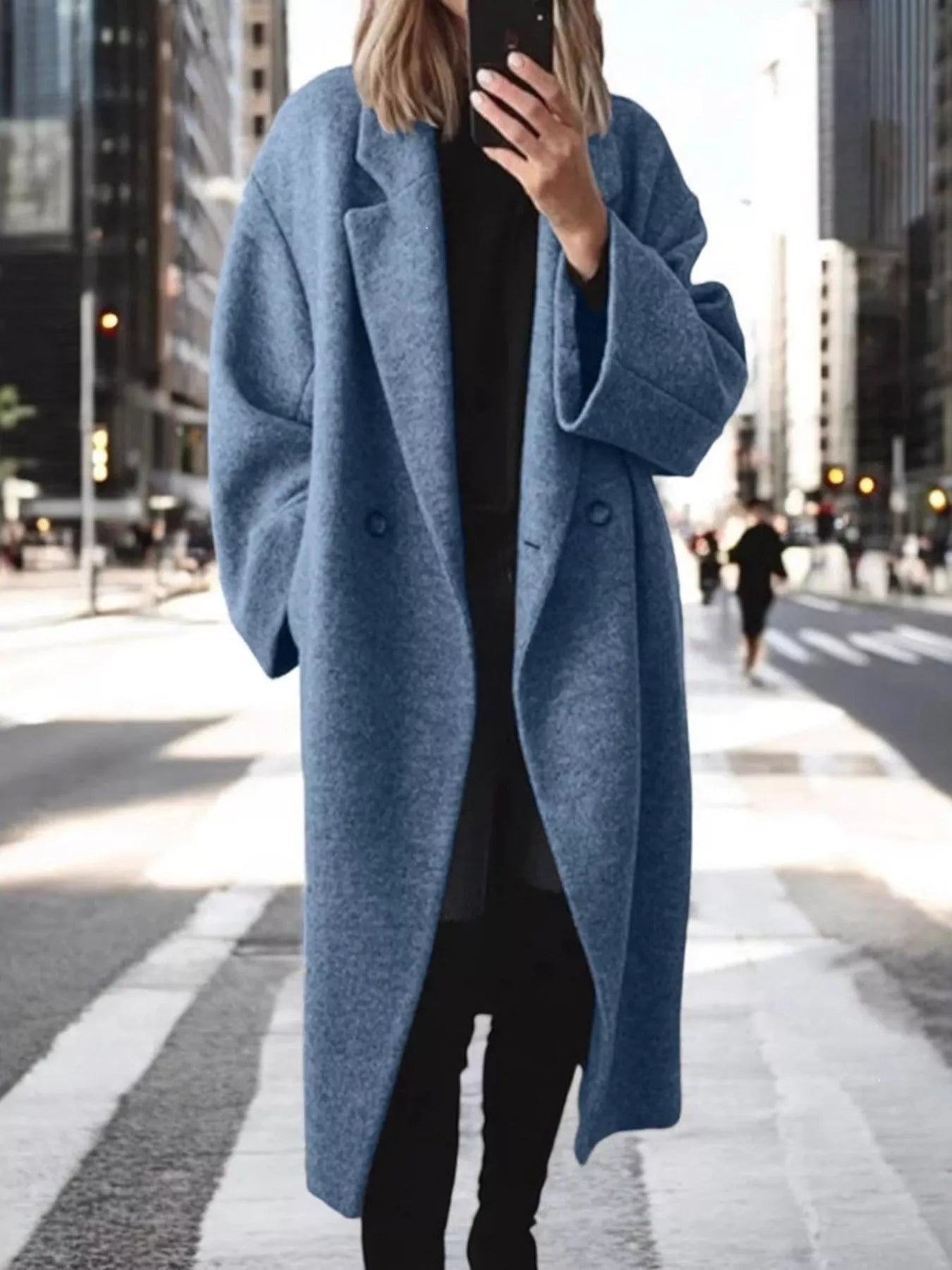 Light blue longline wool-blend coat with notch lapels and double-breasted button front