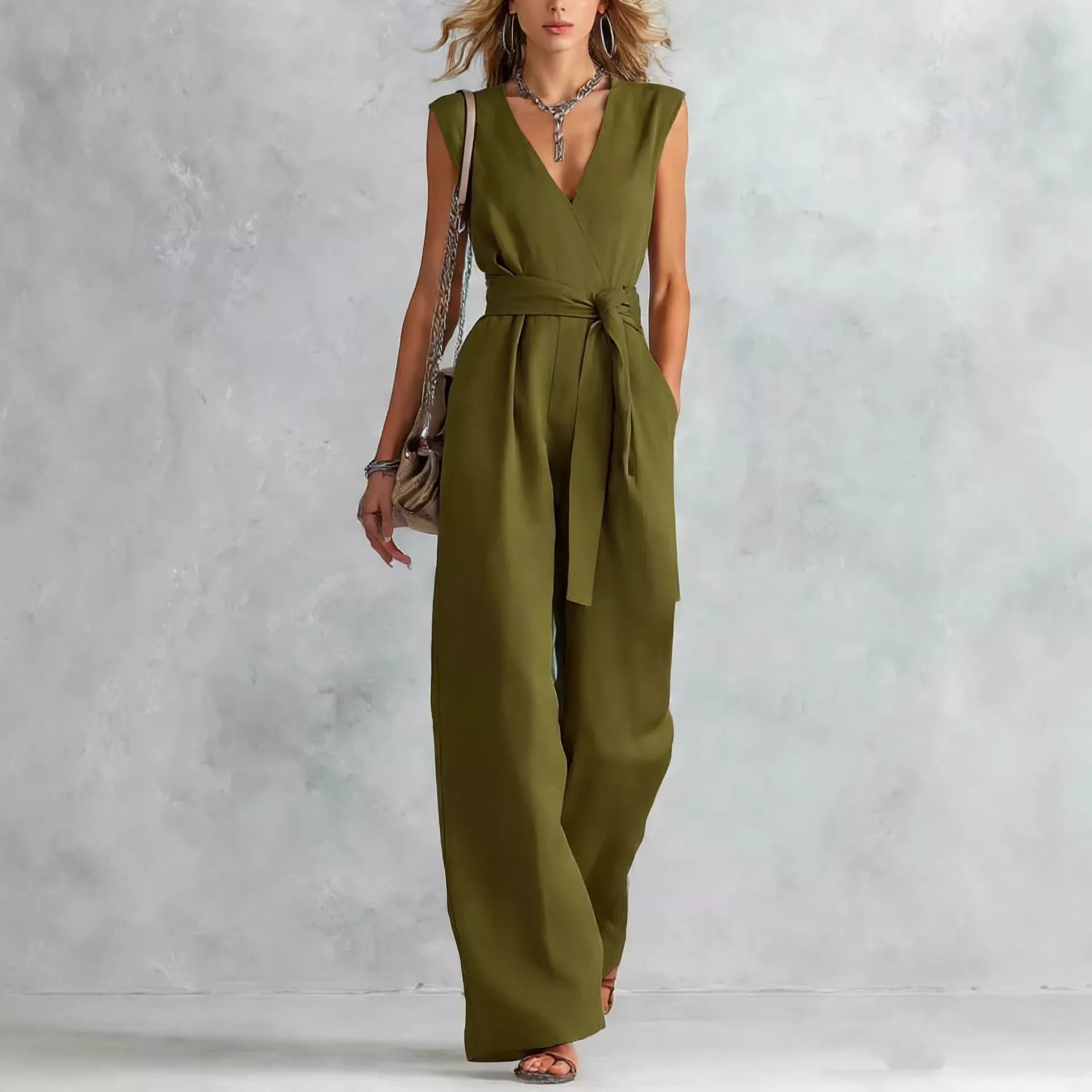 Sleeveless wide-leg jumpsuit in army green with V-neck and waist-tie sash
