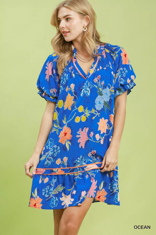 Blue floral mini dress with V-neck, puff sleeves, ruffle hem and contrast trim