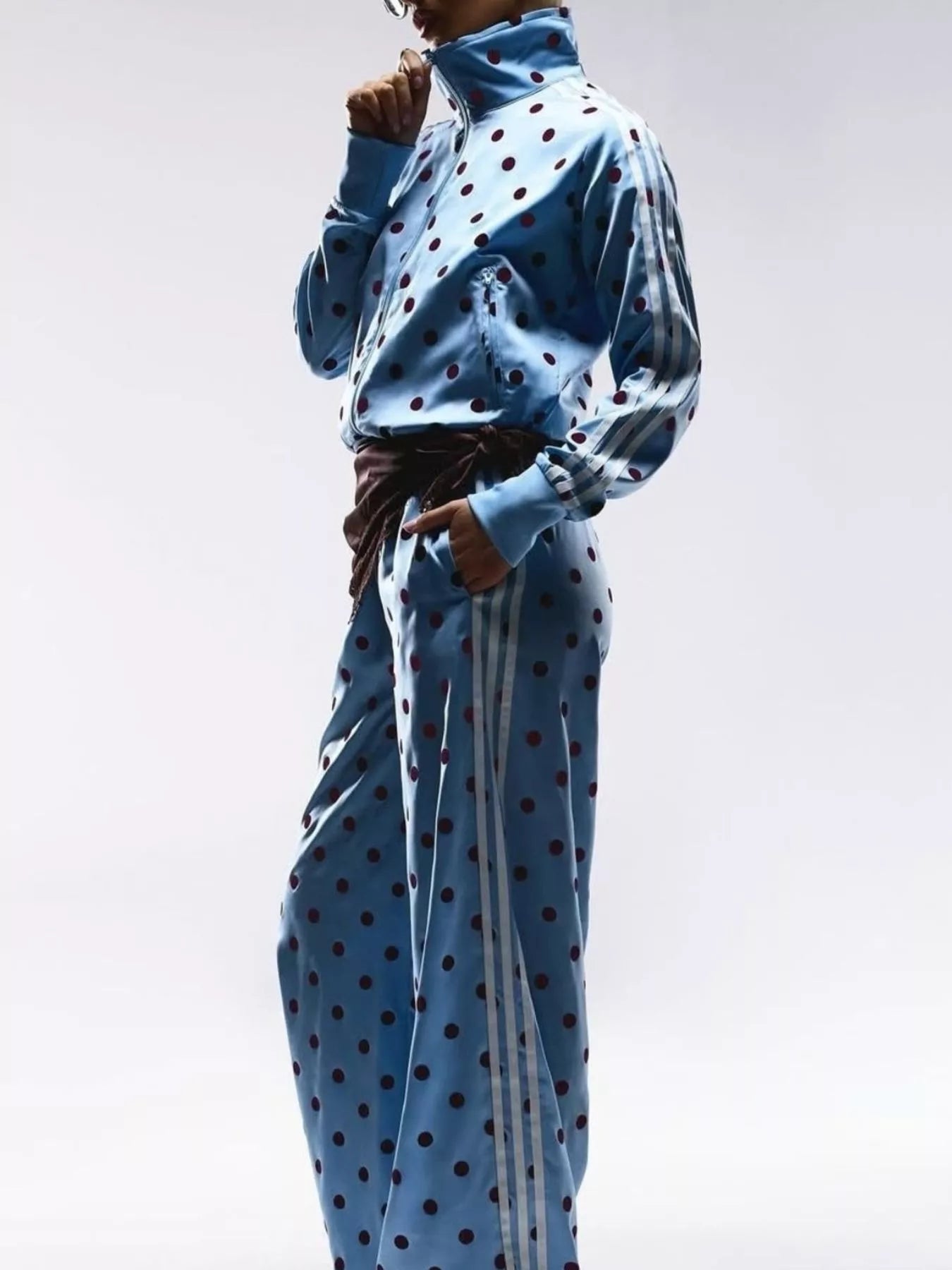 Sky blue polka-dot zip-up jacket and matching pants set with vertical stripe accents
