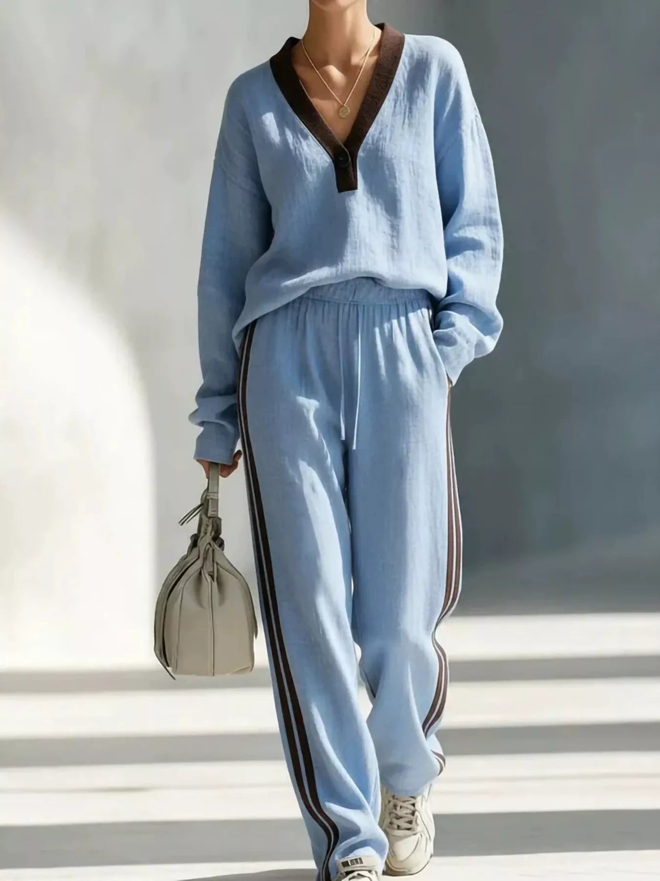 Blue V-neck top and striped jogger pants set with contrast trim, loose fit