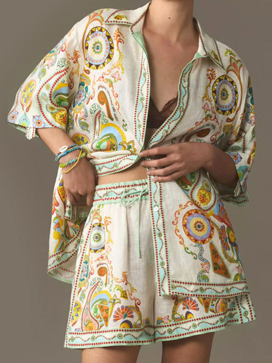 Printed button-up shirt and shorts set with colorful paisley print, short sleeves