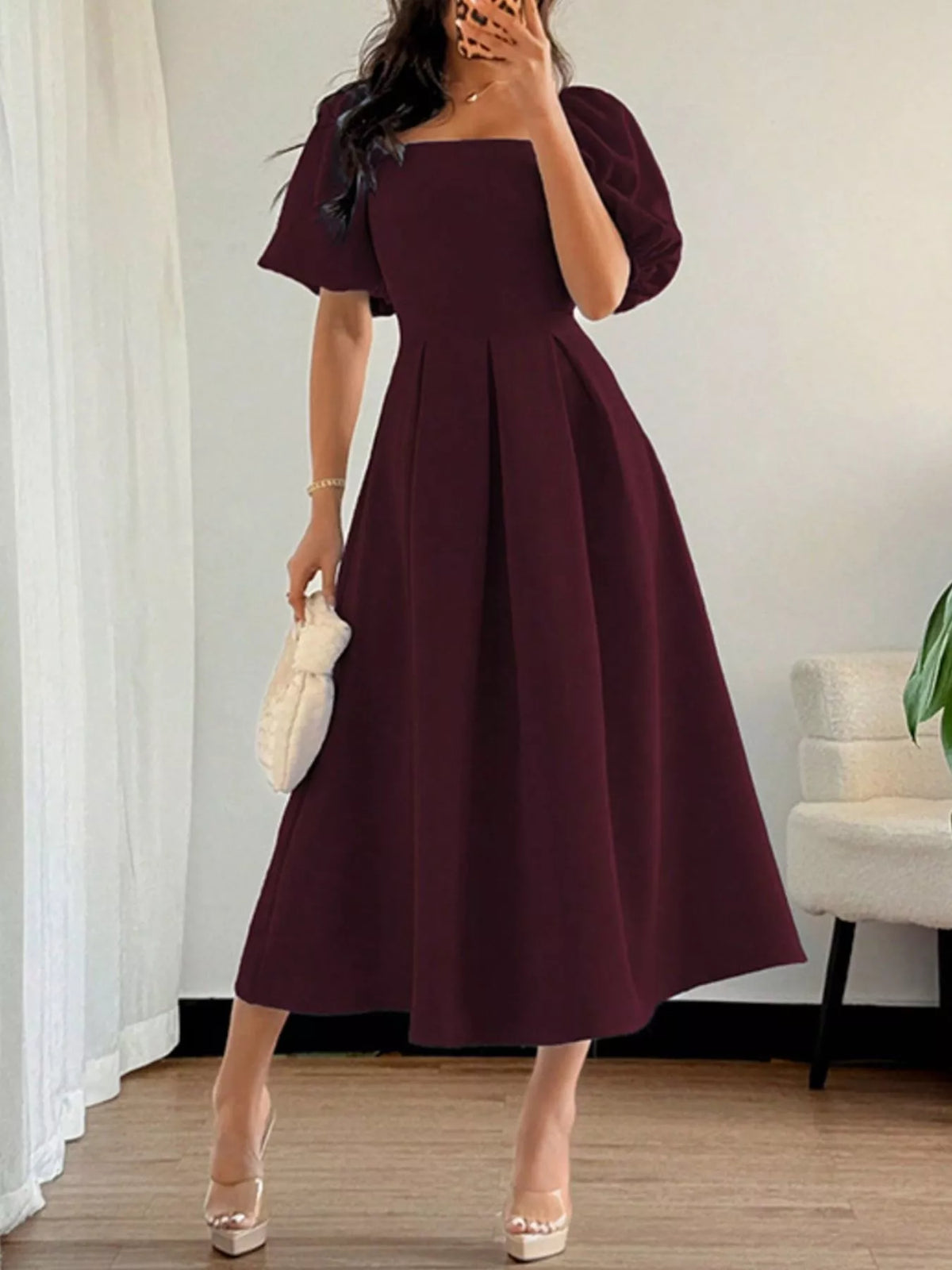Burgundy square-neck flutter sleeve midi dress, side view, puff sleeves and pleated skirt