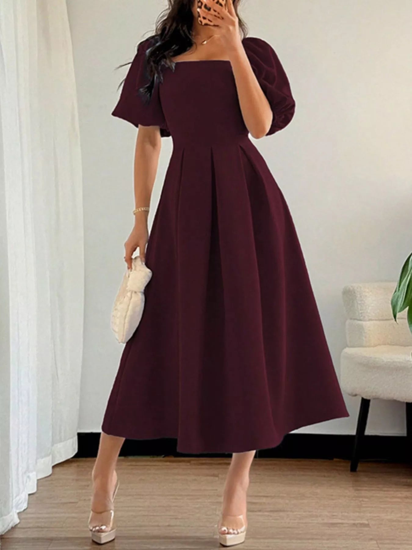 Burgundy square-neck flutter sleeve midi dress, side view, puff sleeves and pleated skirt