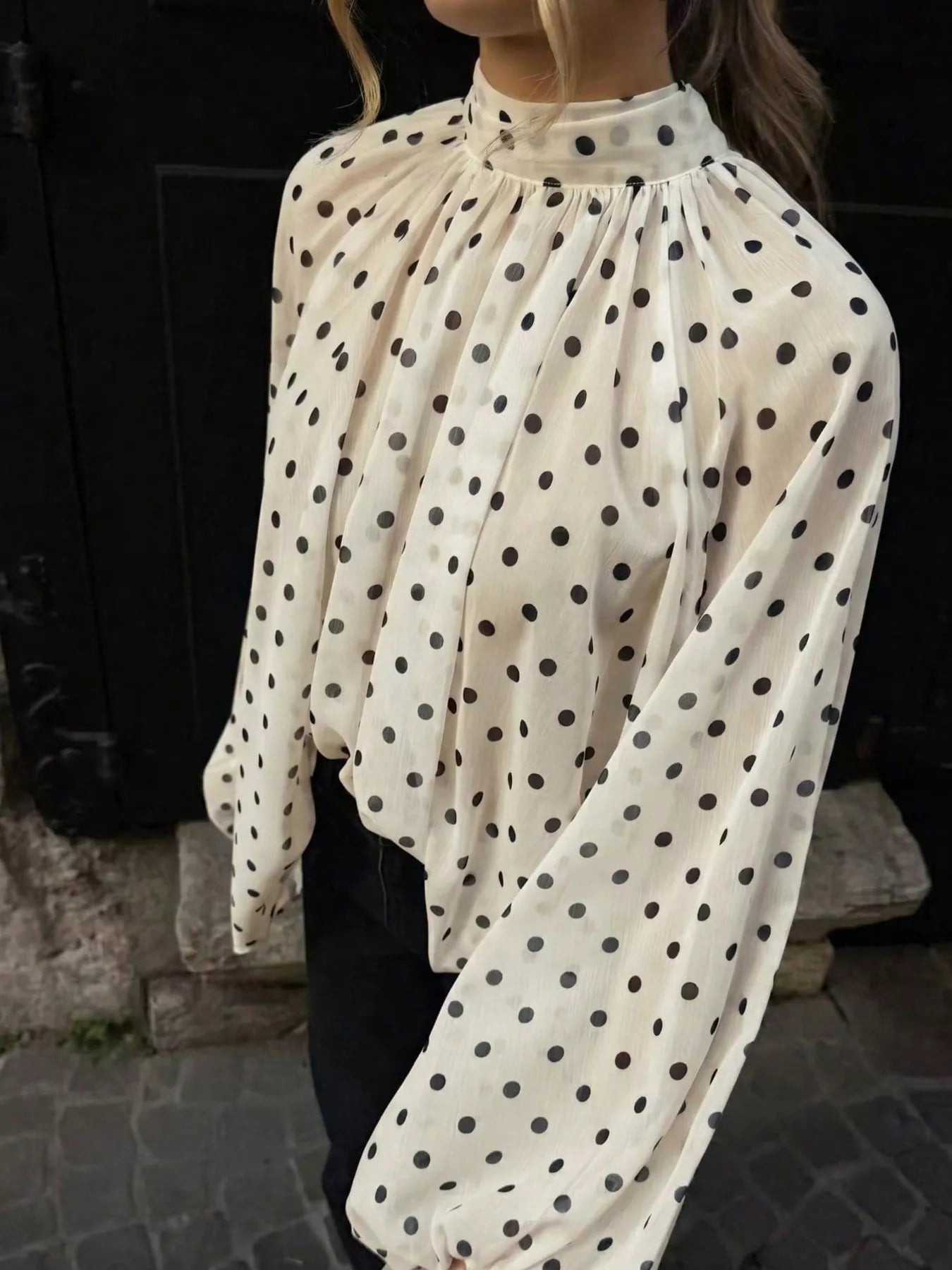 Ivory polka-dot blouse with gathered high neck and balloon sleeves