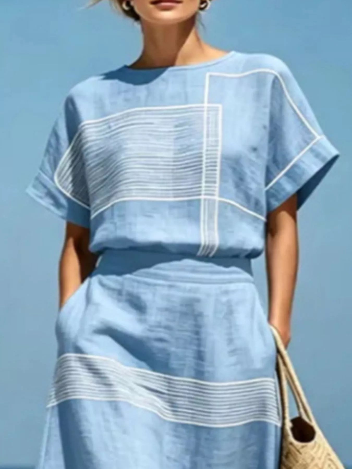 Sky blue striped round neck top and maxi skirt set with layered graphic panels