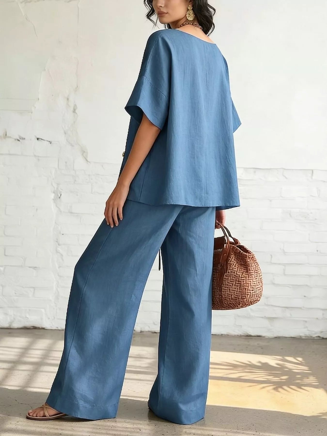 Blue surplice top and wide-leg pants set, short-sleeve back view