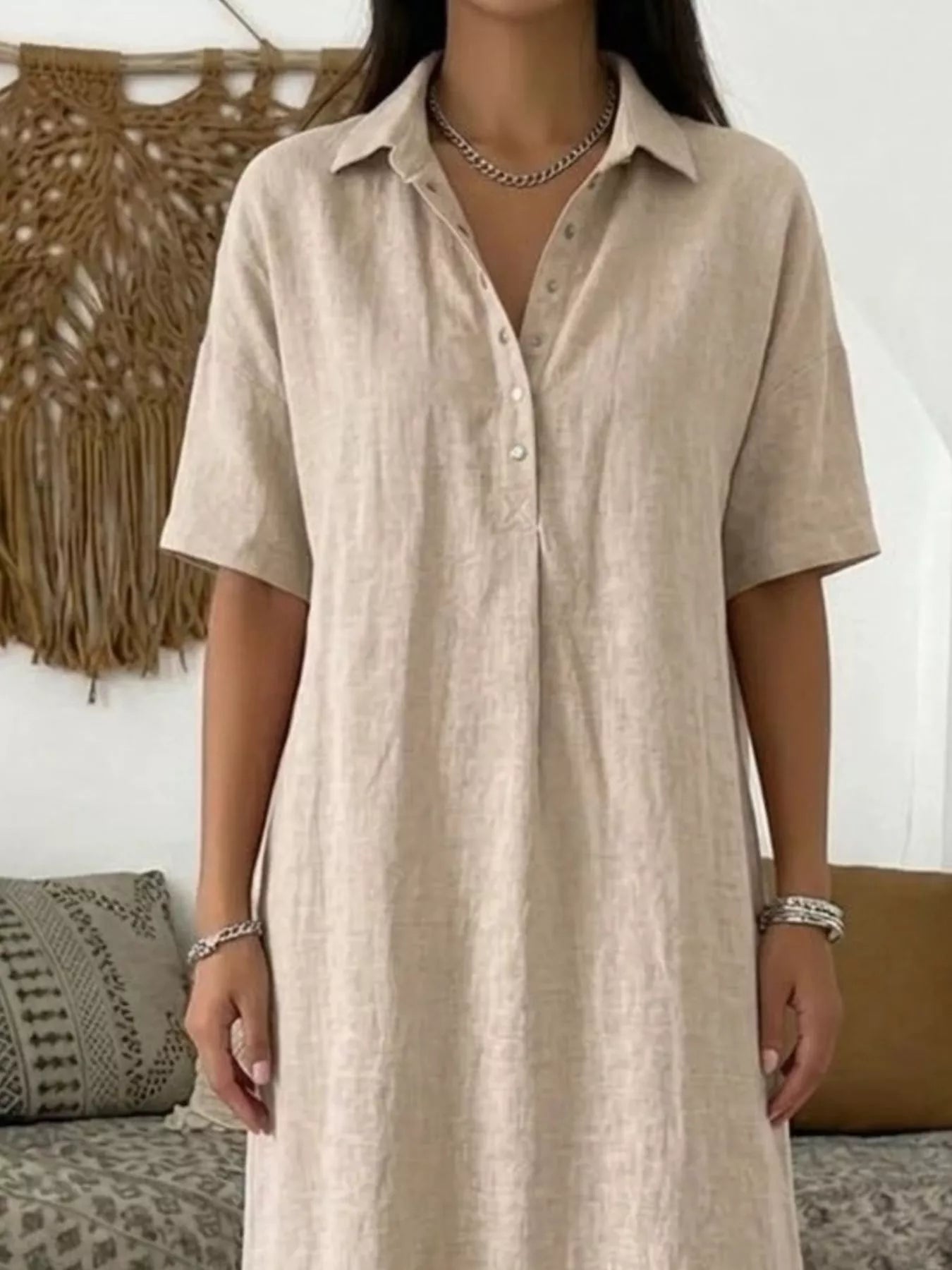 Beige plus-size collared button-front midi dress with short sleeves, button detail