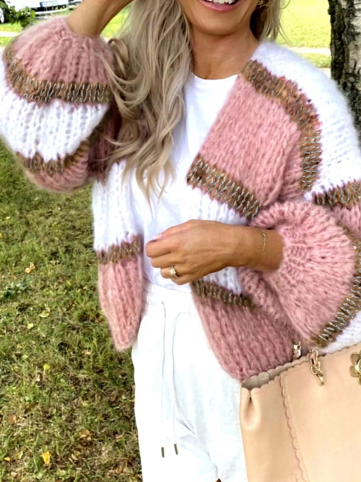 Dusty pink and white striped open-front cardigan with long sleeves, relaxed fit