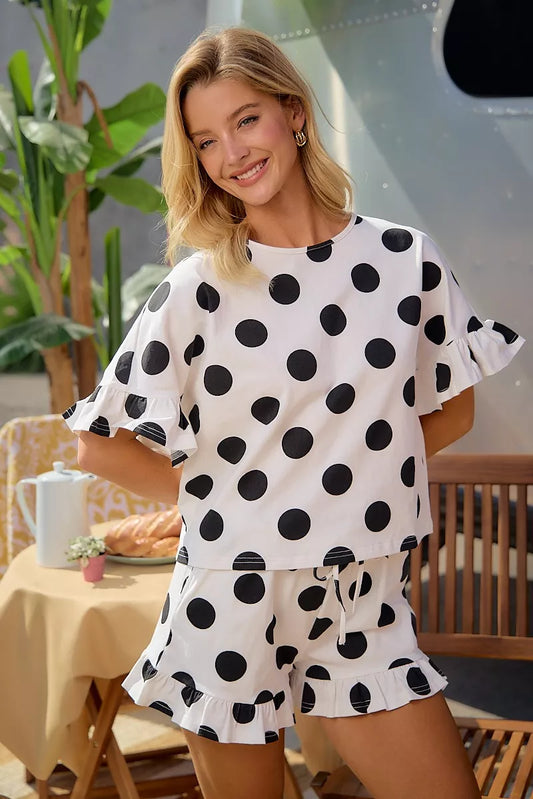 Ivory and black polka dot ruffled top and shorts set, flutter sleeves and tiered hem