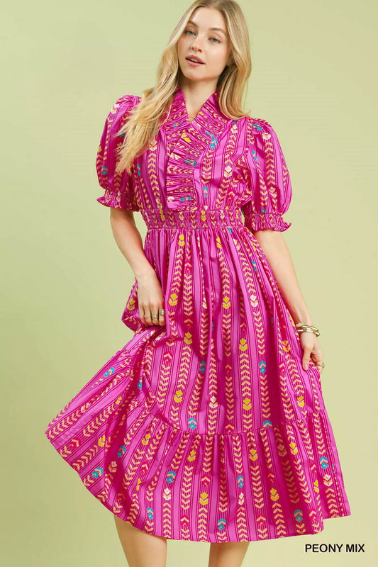 Pink ruffle smocked midi dress with puff sleeves and multicolor geometric print
