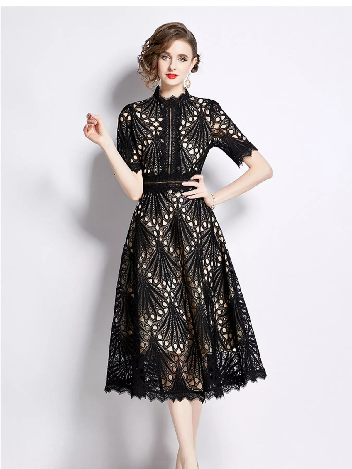 Plus-size lace short-sleeve midi dress in black with decorative lace overlay and belt detail