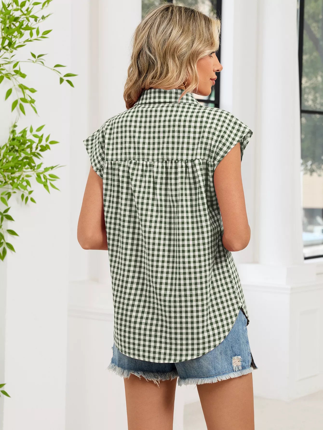 Green-and-white plaid cap-sleeve button-up shirt, back view with shoulder yoke