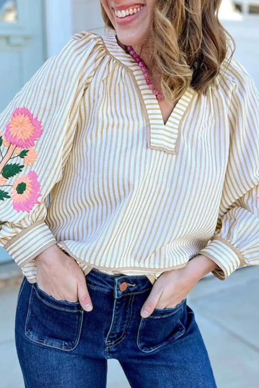 Beige striped V-neck long-sleeve blouse with floral embroidery on sleeves