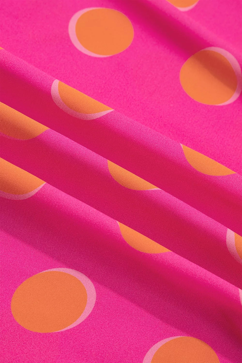 Hot pink midi dress fabric with orange polka-dot pattern