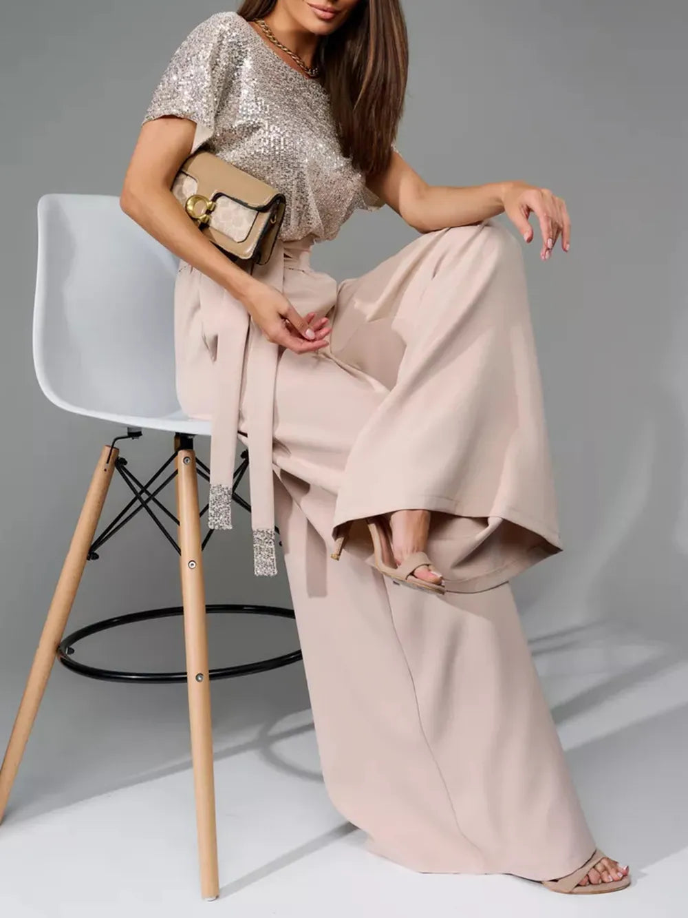 Silver sequin short-sleeve jumpsuit with flowing blush wide-leg trousers