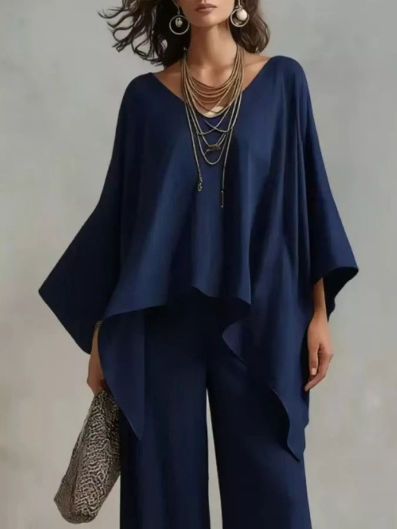 Navy blue V-neck top and wide-leg pants set with layered drape hem and relaxed fit
