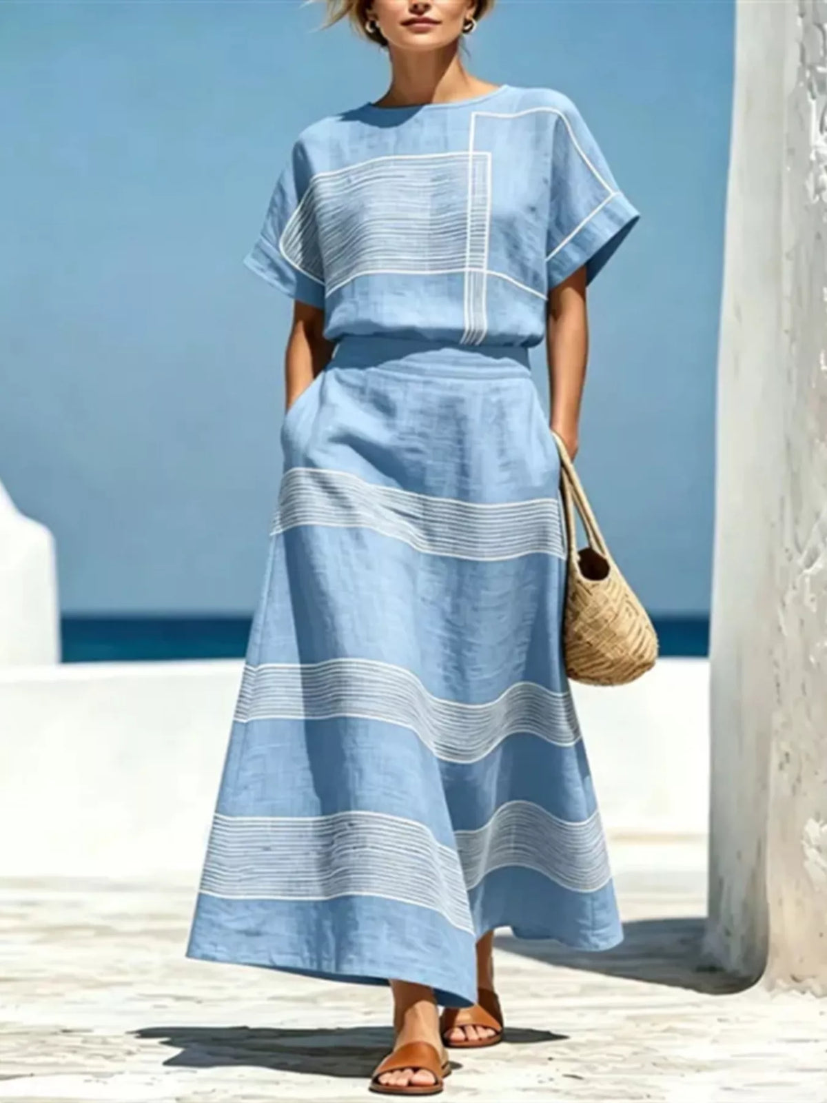 Sky blue striped round neck top and maxi skirt set with layered panel design