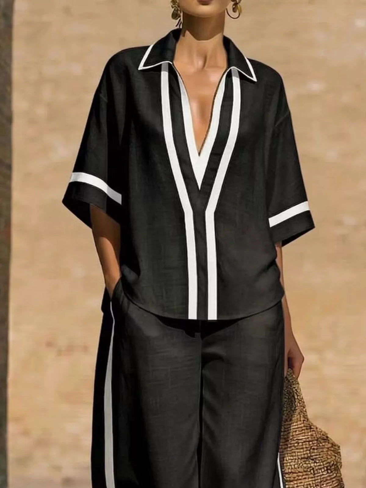 Plus-size contrast-trim short-sleeve top and matching pants set, black with white trim lines